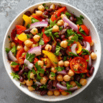Dense bean salad meal with mixed beans and vegetables
