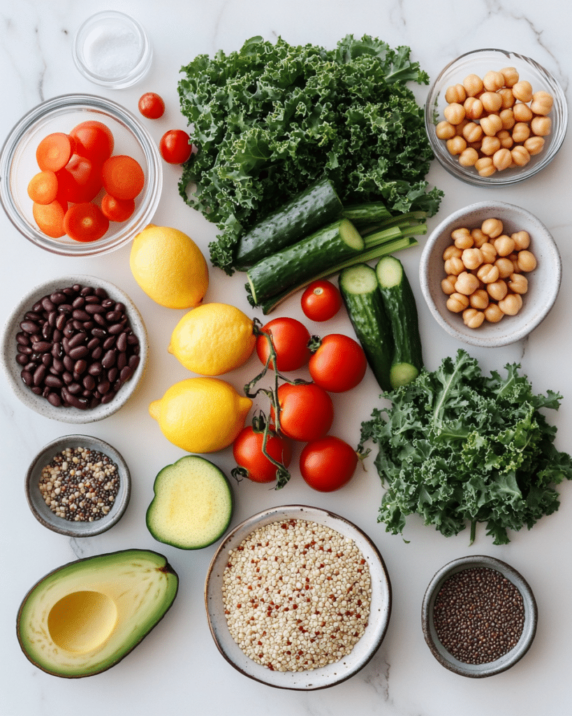 Best High Fiber Salad Recipe: 5 Delicious Ways to Boost Your Fiber Intake 7 High fiber salad ingredients including quinoa, chickpeas, black beans, kale, vegetables, avocado, seeds, lemon, and olive oil.